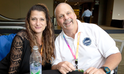 Two APWA members networking at a conference